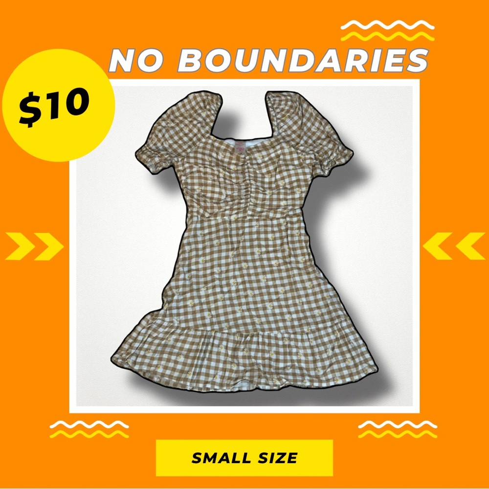 Maxi Dress with White Flower design.Brown color and the length is above the knee